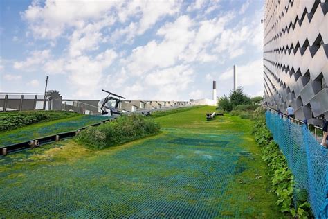 Premium Photo Green Ski Slopes With Slides And Kickers On Top Of The Amager Bakke Copenhill