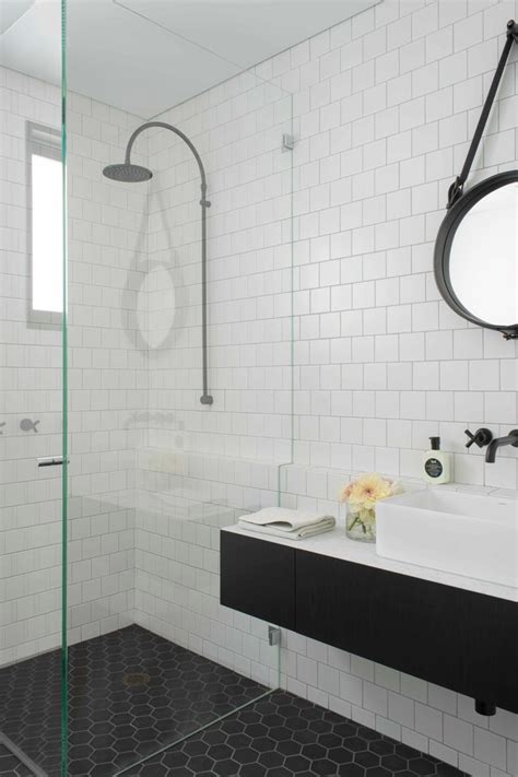 We love a good white subway tile, but did you know a grey and white kitchen featuring a white subway tile backsplash, ikea cabinets, hardwood floors, marble lookalike quartz countertop, and gold hardware. Good-looking Black and White Subway Tile Bathroom with ...