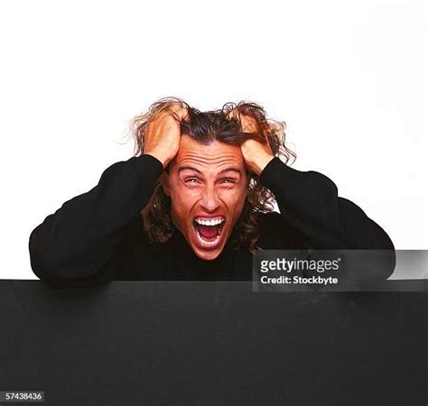 Man Shouting Pulling Hair Photos And Premium High Res Pictures Getty