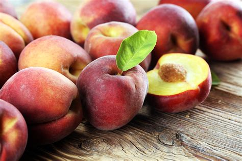 A Group Of Ripe Peaches On Table Bishops Orchards