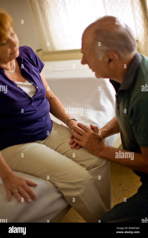 Senior Man Reassuring His Wife In Hospital Room Stock Photo Alamy