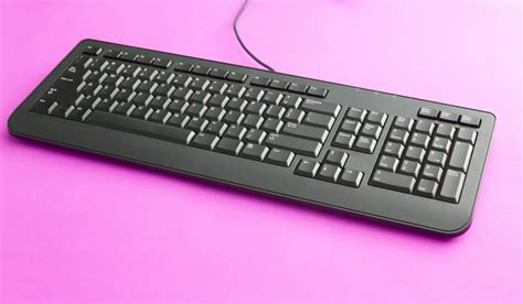 Free Stock Photo 12712 Black Computer Keyboard On Pink Freeimageslive