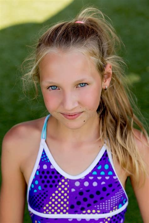 Young Girl In A Swimsuit On A Shelf By The Pool Stock Image Image Of Fashion Rays 111975255