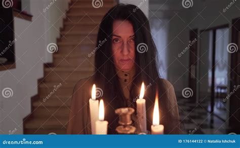 Portrait Of Mysterious Brunette Woman Looking At Camera And Leaving