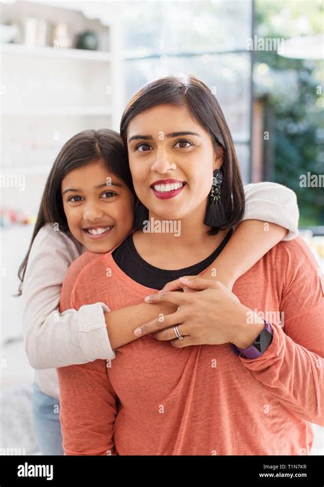 Portrait Happy Mother And Daughter Hugging Stock Photo Alamy