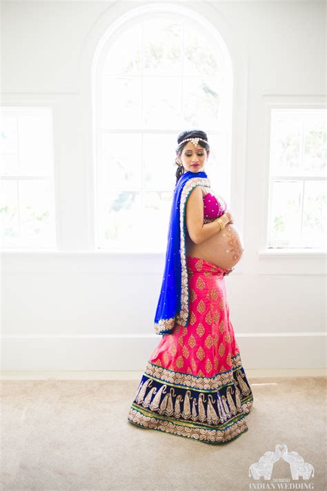 an indian maternity photo shoot with glitters bridal jewellery and henna tattoos — quartz india