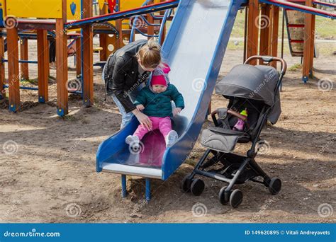 Happy Mom And Daughter Play On The Playground Stock Image Image Of
