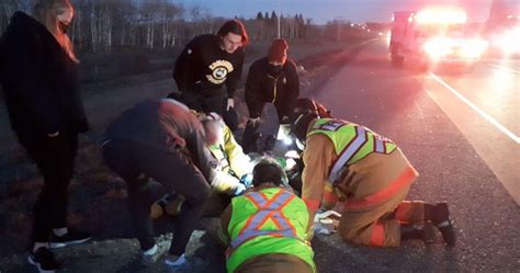 Edmonton Huskies Football Team Help Motorcycle Crash Victim On