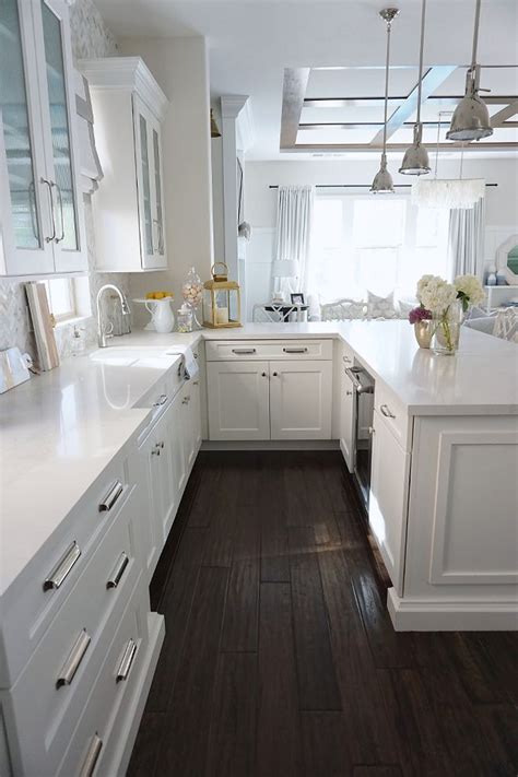 These are usually crated with grey lower or upper cabinets, but in this case, the kitchen appliances do the trick. Kitchen Peninsula. White kitchen with peninsula. Perimeter ...