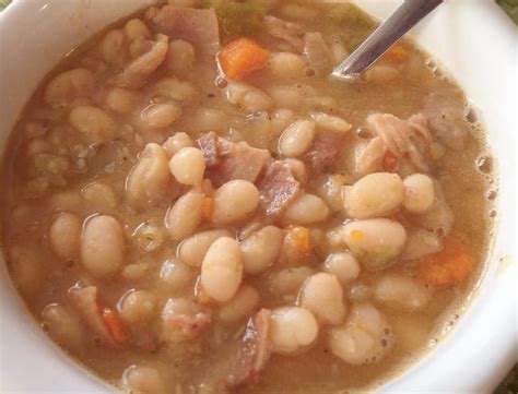Add carrots, onion, celery, garlic, bay leaf, and black pepper to pot; Slow Cooker Ham and White Bean Soup Recipe - Maryann ...