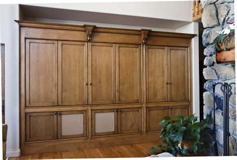Amazing gallery of interior design and decorating ideas of bifold cabinet doors in bedrooms, closets, living rooms, home exteriors, dens/libraries/offices, girl's rooms, bathrooms, laundry/mudrooms, kitchens, entrances/foyers by elite. Hinging for a Bifold Door Retrofit