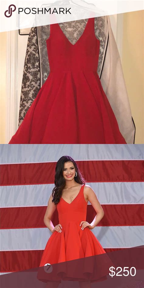 Wear a dazzling red carpet style dress to your next formal occasion. Mac Duggal short dress. Zipper has gold details Red ...