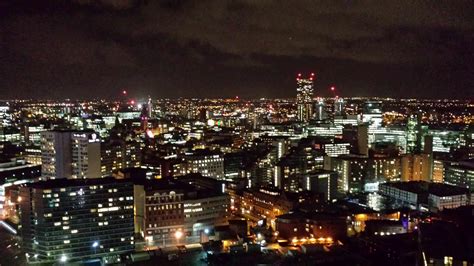 The Skyline Of Manchester Uk At Night Cyberpunk