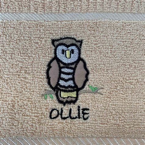 Ollie Owl Kitchen Towel Beige Williamsons Factory Shop