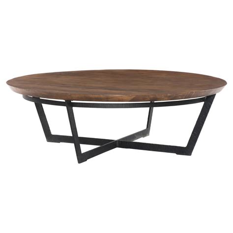 Modern and grounded, this coffee table features narrow slats that wrap around the curved base. Kiel Modern Hammered Black Iron Frame Brown Round Wood Top ...