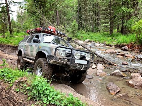 Premium Photo Off Road Vehicle Goes On The Mountain Way Altai