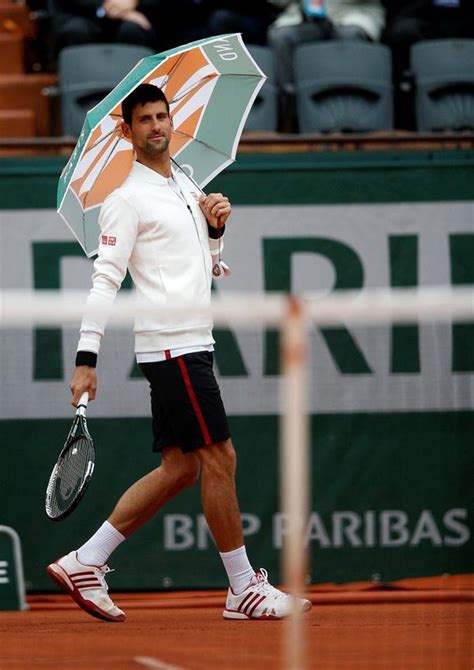 Novak Djokovic — Novak “entertaining” The Crowd During The Rain