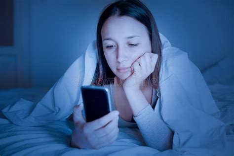 man watching on smartphone the weather forecast on a rainy day stock image image of caucasian