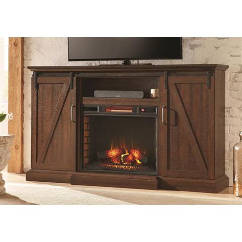 Freestanding media console electric fireplace with barn door in rustic walnut. Home Decorators Collection Chestnut Hill 68 in. Media ...