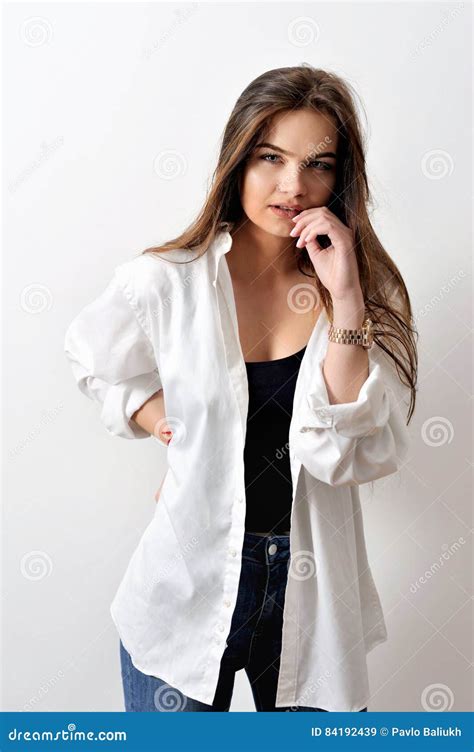 Model Testshoot Of Sensual Girl Is Posing In White Shirt Stock Image