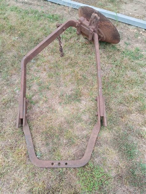 tractor turning plow, Farmall Cub model #152 - Toy Construction