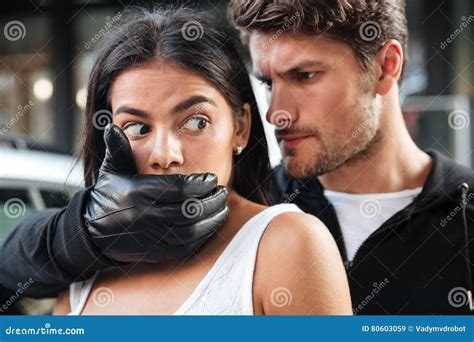 Man Criminal In Gloves Grabbed Scared Woman And Covered Mouth Stock Image Image Of Glance