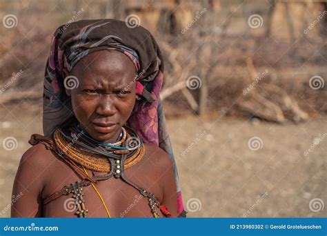 Himba Tribe Woman With Ornaments On The Neck In The Village Of Himba People Close Up Editorial