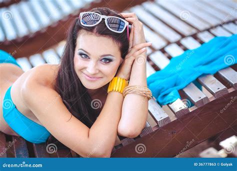 Woman Sunbathing In Bikini At Tropical Travel Resort Beautiful Young