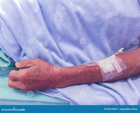 Arm Of Asian Old Man Patient With An Iv Solutions Stock Image Image