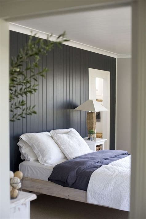 The Dark Painted Wood Paneling Feature Wall Makes Quite A Statement In
