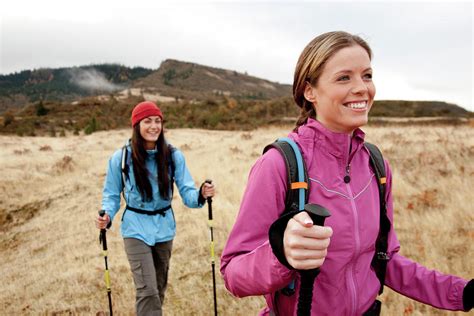 Two Females Smile While Day Hiking Photograph By Jordan Siemens Fine