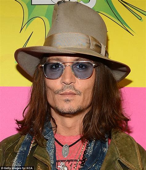 Johnny Depp Reveals The Real Reason Behind His Famous Tinted Glasses