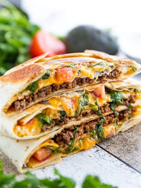 Ground meat (chicken or beef) seasoned with a homemade taco seasoning mix, layered up with cheese, peppers, crispy baked. Homemade Crunchwrap Supreme recipe includes a video and is ...