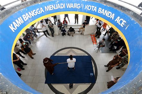 couples punished with 20 lashes of the cane for having sex outside marriage in indonesia daily