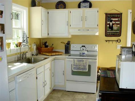 Painting your kitchen cabinets is a lot like painting a piece of furniture, just 1,000 times move appliances back into place, and maybe clean out your cabinets/ drawers if you're feeling productive what color paint did you use on your walls? Paint Colors for Kitchen with White Cabinets - Decor ...