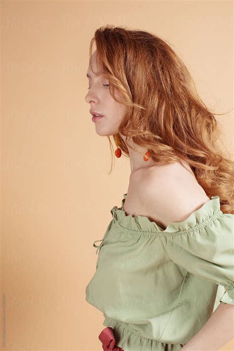 Portrait Of A Beautiful Woman With Ginger Hair By Stocksy Contributor Irina Ozhigova Stocksy