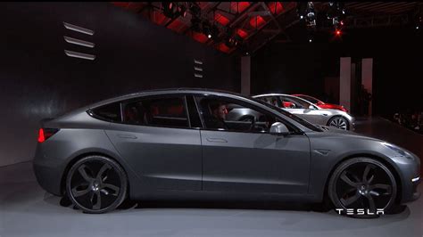 Tesla Model 3 finally makes it to UK showrooms
