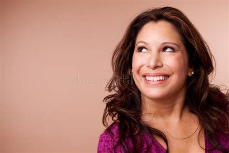 Beautiful Hispanic Woman Smiling And Looking Up Stock Photo Image Of