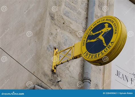 Interflora Logo Text And Brand Sign Store Front Windows Facade Of