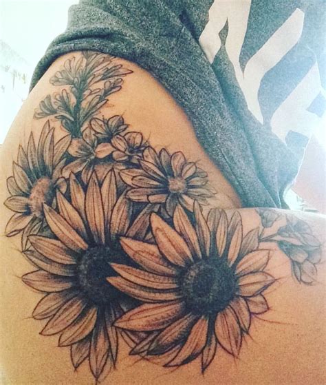 Pin By Madi On The Story Sunflower Tattoos Flower Thigh Tattoos