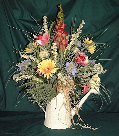 Spring Centerpiece In A Watering Can Flower Arrangements Diy Floral