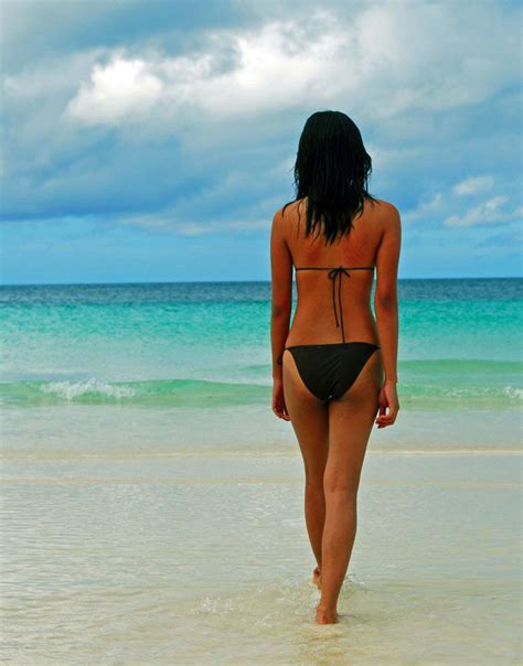 Girl In Bikini On Boracay Beach In The Philippines Facing Play Top