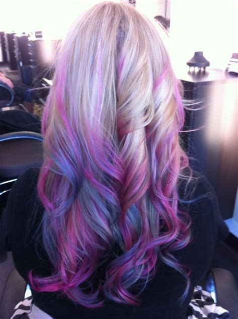 Here, muted pink is blending through with a punchy purple balayage to create this fresh and fabulous style. Smokey purple blue blonde ombre hair | Hairstyles | Pinterest