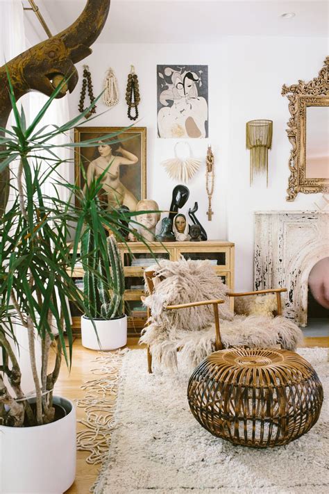 I have a fun dining room reveal to share with you all! Boho living room with sheepskin on a midcentury modern ...