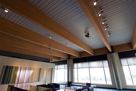 Decorative ceiling tiles has the decorative metal sheets you need for your project. Roof Deck Ceiling System by Epicore | Modern roofing, Roof ...