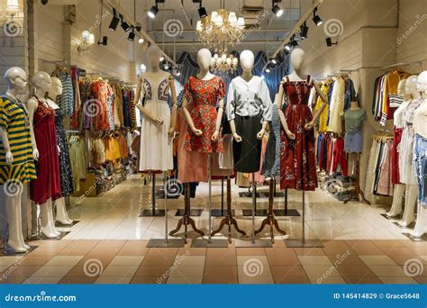Mannequins With Clothes And Dresses Display In The Fashion Store