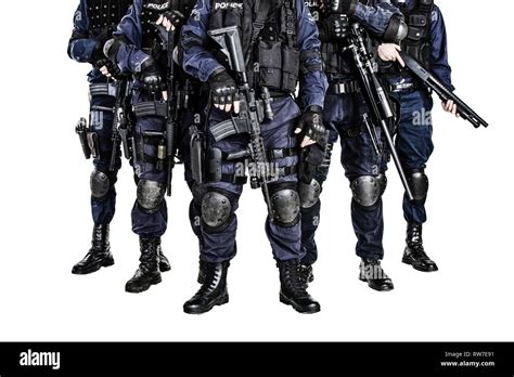 Special Weapons And Tactics Swat Team Officers With Guns Stock Photo