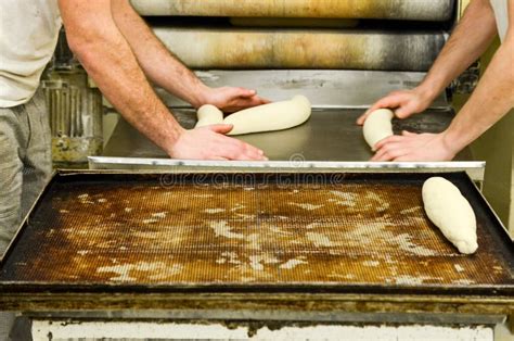 Baker Hands Kneading Bread Dough In Bakery Making Bread Men Manually