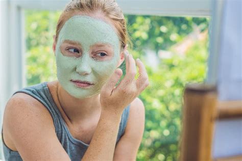 Spa Woman Applying Facial Green Clay Mask Beauty Treatments Stock