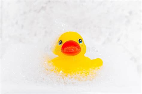 Yellow Cheerful Toy Rubber Duck In Bath Foam Baby Spa Concept Kids